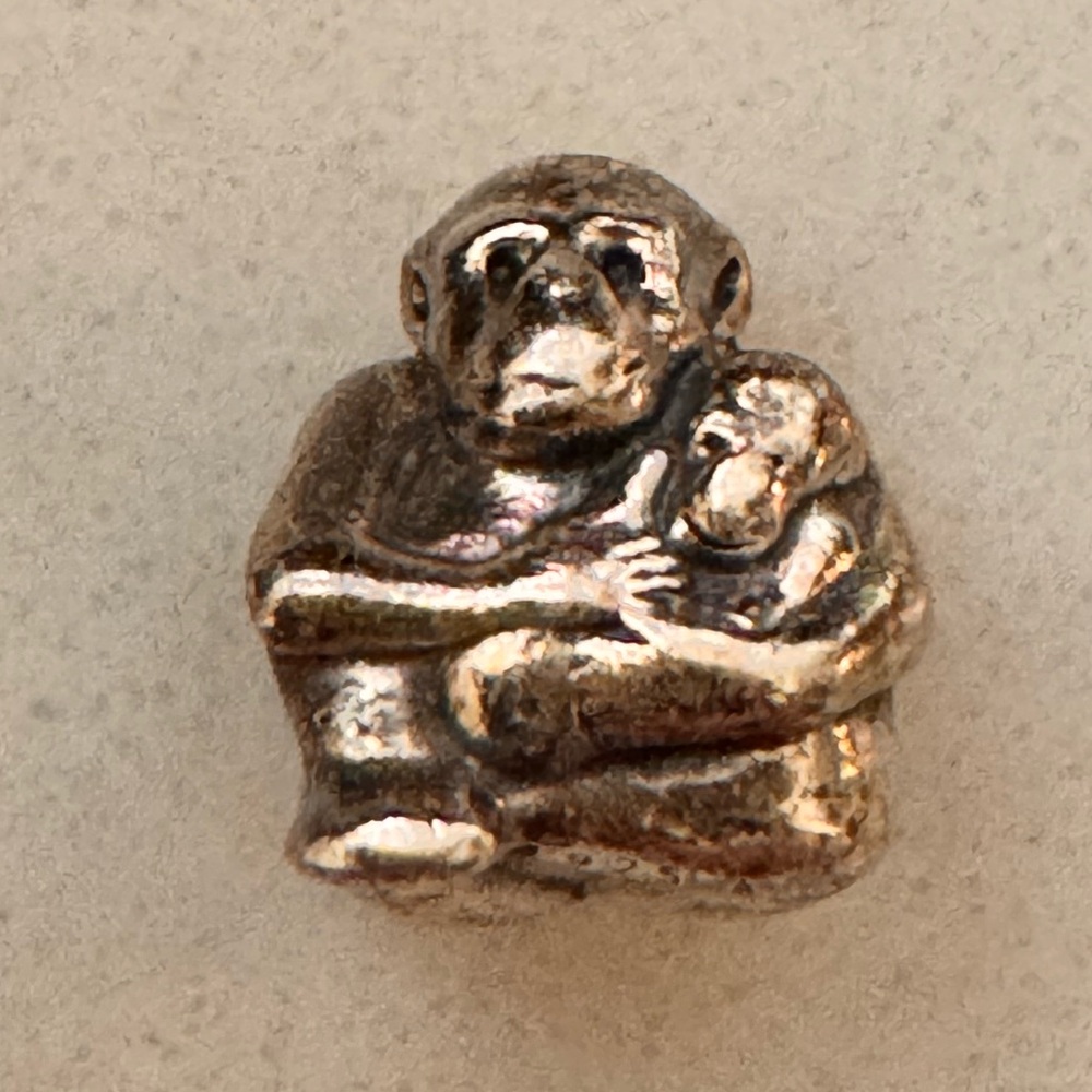 Pandora, gorilla holding baby charm